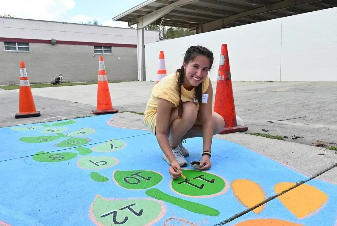 The finished lily pad hopscotch game painted along the sidewalk